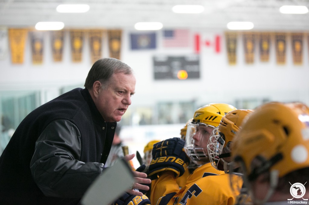 Trenton coach Mike Turner talks to his players during the game that saw him match the all-time wins total. (Photo by Andrew Knapik/MiHockey)