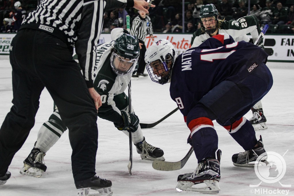Auston Matthews, expected No. 1 overall pick in the 2016 NHL Draft, takes a face-off at Munn Ice Arena in a game against MSU last season. (Photo by Michael Caples/MiHockey)