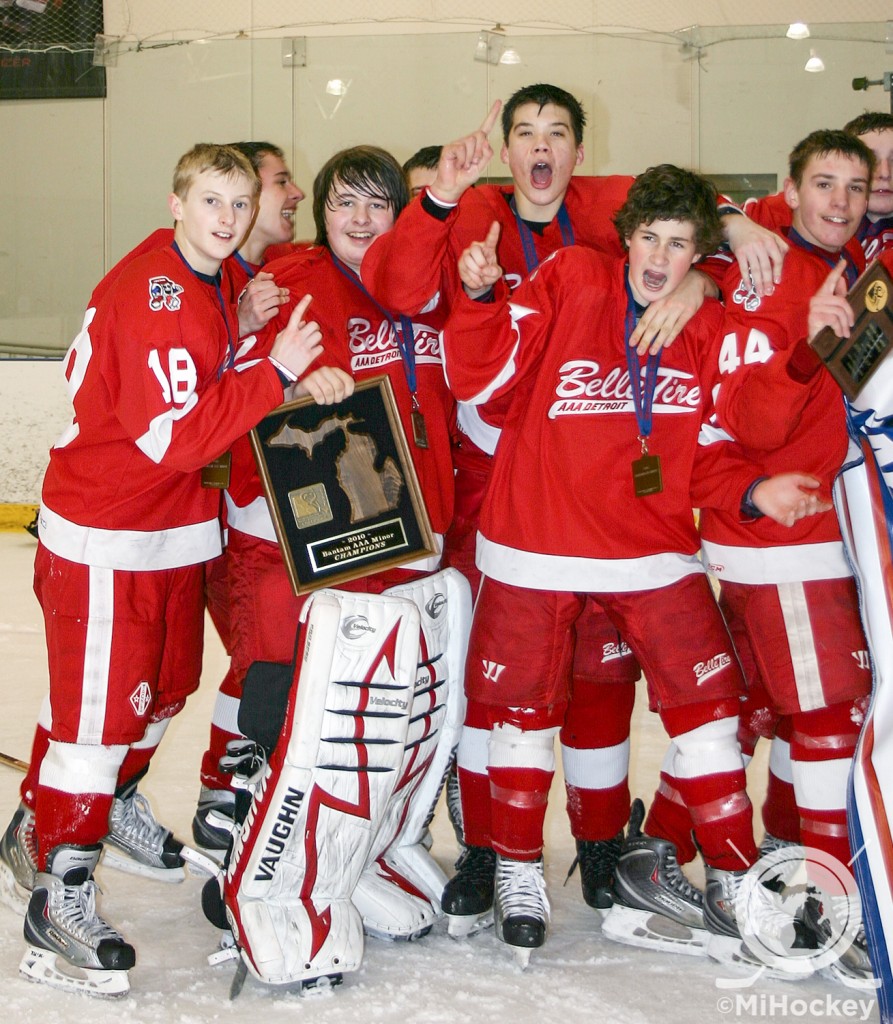 Kyle Connor, Josh Jacobs and Dylan Larkin celebrating a state title