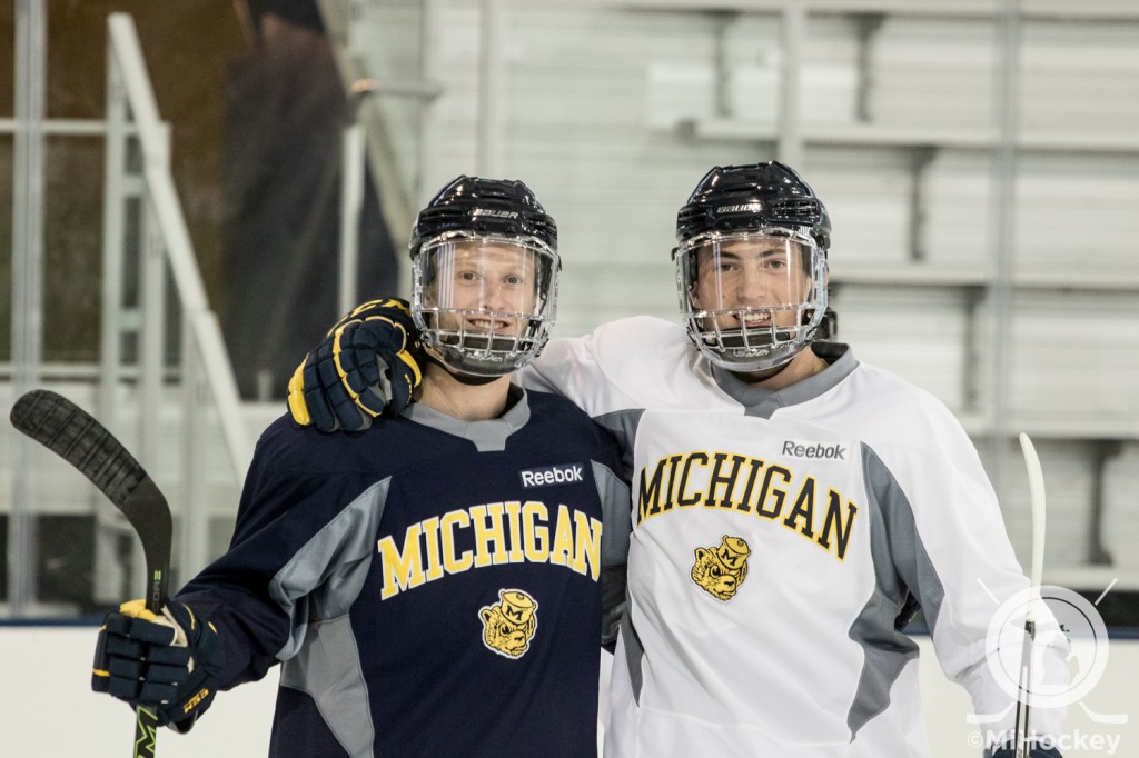 Connor and Werenski pose for a photo before Monday's practice. (Photo by Michael Caples/MiHockey)