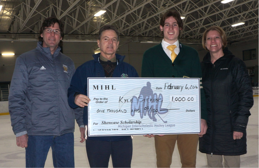 Kyle Sitkins, joined by his parents Fred and Lisa, accepts his David Mannino Scholarship from MIHL president Andrew Weidenbach. (Photo courtesy of the MIHL)