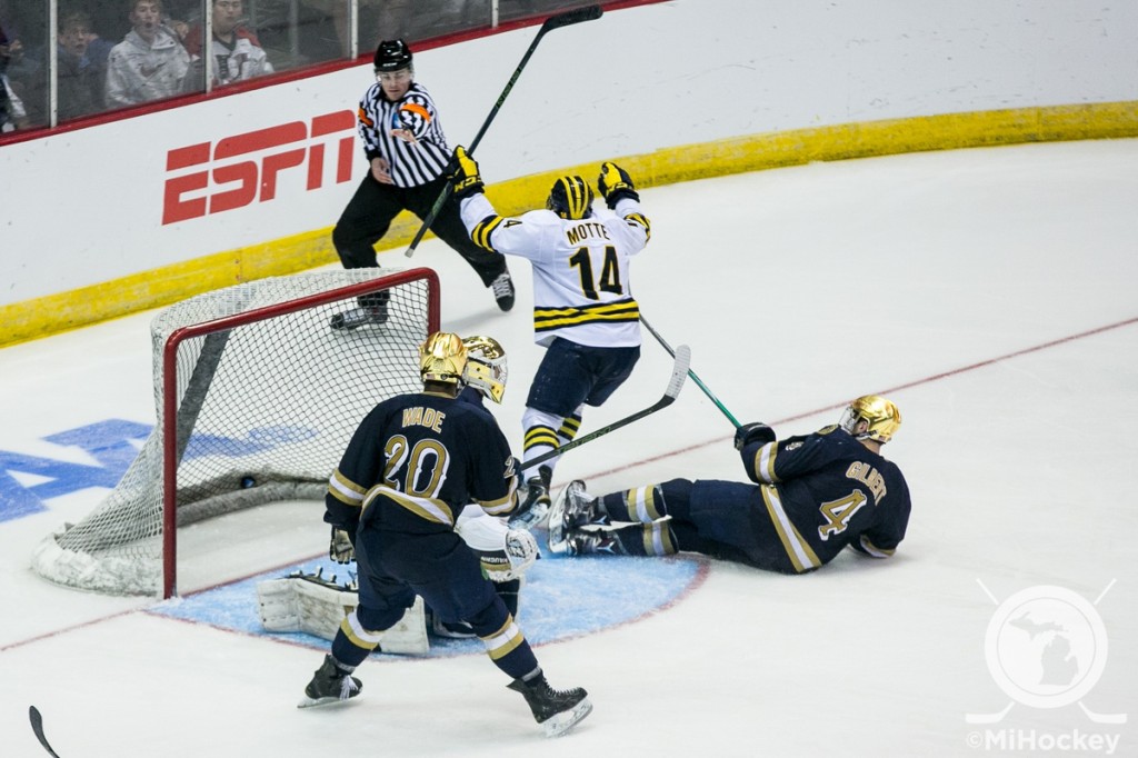 Tyler Motte celebrates his game-winning goal in overtime of the Wolverines' NCAA tournament showdown with Notre Dame. (Photo by Andrew Knapik/MiHockey)