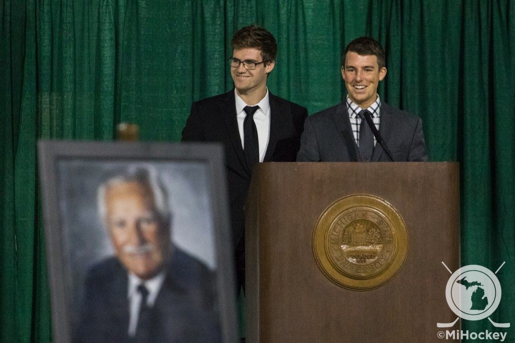 Mason's grandchildren - Travis and Tyler Walsh - during their joint speech remembering the Spartans' legendary head coach. (Photo by Michael Caples/MiHockey)