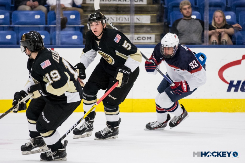Muskegon Lumberjacks defenseman and Michigan native Scooter Brickey (middle) is one of XX Michigan natives on the NHL Central Scouting's November players to watch list. (Photo by Michael Caples/MiHockey)