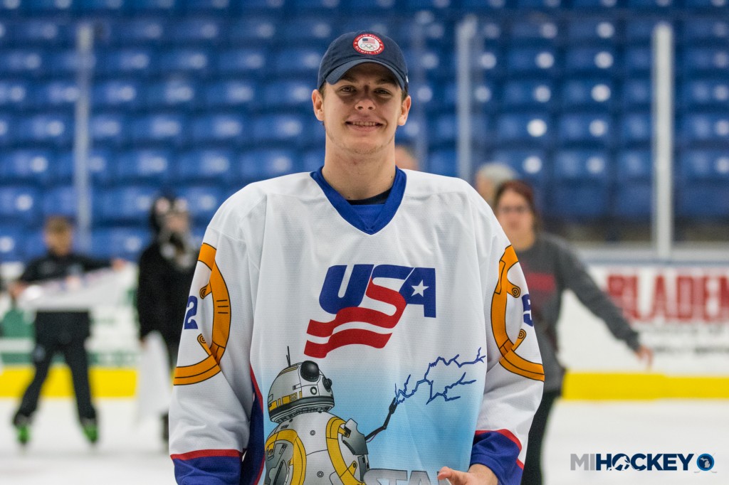 Bode Wilde models the new Star Wars Night jerseys for his NTDP team. (Photo by Michael Caples/MiHockey)